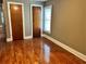 Hardwood floors and neutral walls in this bedroom at 2203 Hillcrest Ave, Decatur, GA 30032