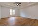 Bright and spacious bedroom with hardwood floors and a ceiling fan at 2861 Tree Top Rd, Dacula, GA 30019