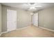Bright bedroom with neutral walls and carpet at 320 Pintail Ct, Suwanee, GA 30024