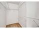 Spacious walk-in closet with wire shelving at 320 Pintail Ct, Suwanee, GA 30024