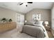 Main bedroom with ensuite bath and dresser at 320 Pintail Ct, Suwanee, GA 30024