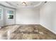 Bright living room with tile floors and recessed lighting at 2669 Saint Paul Sw Dr, Atlanta, GA 30331
