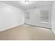 Bright bedroom with neutral walls and carpet flooring at 2669 Saint Paul Sw Dr, Atlanta, GA 30331