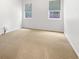 Spacious bedroom with neutral carpeting and large windows at 2669 Saint Paul Sw Dr, Atlanta, GA 30331