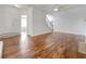 Bright living room with hardwood floors and access to other rooms at 2669 Saint Paul Sw Dr, Atlanta, GA 30331
