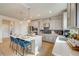 Modern kitchen with stainless steel appliances and white cabinets at 21 Bennett Farm Dr, Loganville, GA 30052