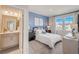 Bright bedroom with ensuite bathroom and a view at 21 Bennett Farm Dr, Loganville, GA 30052