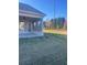 Fenced backyard with patio and spacious lawn area at 2404 Anhinga Dr, Loganville, GA 30052