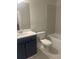 Clean bathroom with a single vanity, toilet, and bathtub at 2404 Anhinga Dr, Loganville, GA 30052