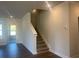 Elegant staircase leading to the upper level of the home at 2404 Anhinga Dr, Loganville, GA 30052