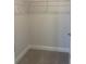 Walk-in closet with wire shelving at 2414 Anhinga Dr, Loganville, GA 30052
