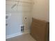 Convenient laundry room with shelving and built-in storage at 2414 Anhinga Dr, Loganville, GA 30052