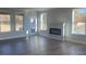 Spacious living room with fireplace and hardwood floors at 2414 Anhinga Dr, Loganville, GA 30052