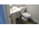 Clean bathroom with pedestal sink and toilet at 559 Fundao Ln # 21, Lawrenceville, GA 30046