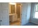 Bathroom with granite countertop and walk-in shower at 559 Fundao Ln # 21, Lawrenceville, GA 30046