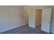 Spacious bedroom with neutral walls and carpet at 559 Fundao Ln # 21, Lawrenceville, GA 30046