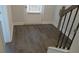 View of entryway with luxury vinyl plank flooring and interior door at 559 Fundao Ln # 21, Lawrenceville, GA 30046