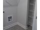 Laundry room with tile floor and wire shelving at 559 Fundao Ln # 21, Lawrenceville, GA 30046