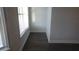 Small office space with vinyl plank flooring and window with blinds at 559 Fundao Ln # 21, Lawrenceville, GA 30046