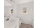 Clean bathroom with single sink vanity, toilet and bathtub at 1641 Lacebark Elm Way, Lawrenceville, GA 30045