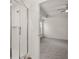Bathroom with a shower and view into bedroom at 1641 Lacebark Elm Way, Lawrenceville, GA 30045