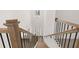 View of staircase from upstairs overlooking entryway at 1641 Lacebark Elm Way, Lawrenceville, GA 30045