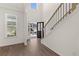 Bright and airy entryway with hardwood floors and view of backyard at 1641 Lacebark Elm Way, Lawrenceville, GA 30045