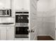 Walk-in pantry with ample shelving for storage at 1641 Lacebark Elm Way, Lawrenceville, GA 30045