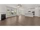 Open concept kitchen with white cabinets and island at 1641 Lacebark Elm Way, Lawrenceville, GA 30045