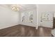 Bright dining room with hardwood floors and large windows at 1641 Lacebark Elm Way, Lawrenceville, GA 30045
