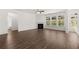 Spacious Gathering room with hardwood floors, fireplace, and abundant natural light at 1641 Lacebark Elm Way, Lawrenceville, GA 30045