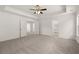 Main bedroom with carpet, access to bathroom, and additional room at 1641 Lacebark Elm Way, Lawrenceville, GA 30045