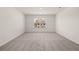 Bright bedroom with carpet and large window at 1641 Lacebark Elm Way, Lawrenceville, GA 30045