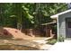 Landscaped backyard with gravel pathway and lush greenery at 3331 Elm Creek Nw Dr, Marietta, GA 30064