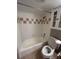 Clean bathroom with shower/tub combo, toilet, and a cabinet at 2955 Seven Pines Ln # 206, Atlanta, GA 30339
