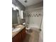 Clean bathroom with tub, shower, and granite vanity at 2955 Seven Pines Ln # 206, Atlanta, GA 30339