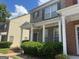 Brick townhome with front porch and landscaping at 4870 Hairston Park Sq, Stone Mountain, GA 30083