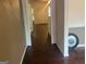 Hardwood floor hallway with neutral walls at 4870 Hairston Park Sq, Stone Mountain, GA 30083