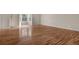 Spacious living room with gleaming hardwood floors at 8446 Donald Rd, Snellville, GA 30039