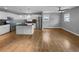 Open concept kitchen and living area with hardwood floors at 2653 Tilson Rd, Decatur, GA 30032