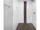 Clean and modern shower with dark mosaic tile accents at 2653 Tilson Rd, Decatur, GA 30032