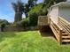 Wooden deck with stairs and grassy backyard at 2653 Tilson Rd, Decatur, GA 30032