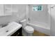 Updated bathroom with white subway tile and a bathtub at 2653 Tilson Rd, Decatur, GA 30032