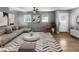 Spacious living room with hardwood floors, a neutral color palette, and ample natural light at 2653 Tilson Rd, Decatur, GA 30032