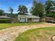 Newly renovated light gray house with a blue door at 2653 Tilson Rd, Decatur, GA 30032