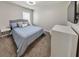 Relaxing bedroom with a plush bed and large TV at 437 Livingston Pt, Acworth, GA 30102