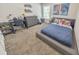 Spacious bedroom with a comfortable bed and built-in desk at 437 Livingston Pt, Acworth, GA 30102