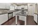 Modern kitchen with stainless steel appliances and granite countertops at 437 Livingston Pt, Acworth, GA 30102