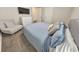 Serene bedroom with a cozy bed and sitting area at 437 Livingston Pt, Acworth, GA 30102