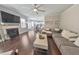 Open living room with sectional sofa and view into kitchen at 437 Livingston Pt, Acworth, GA 30102